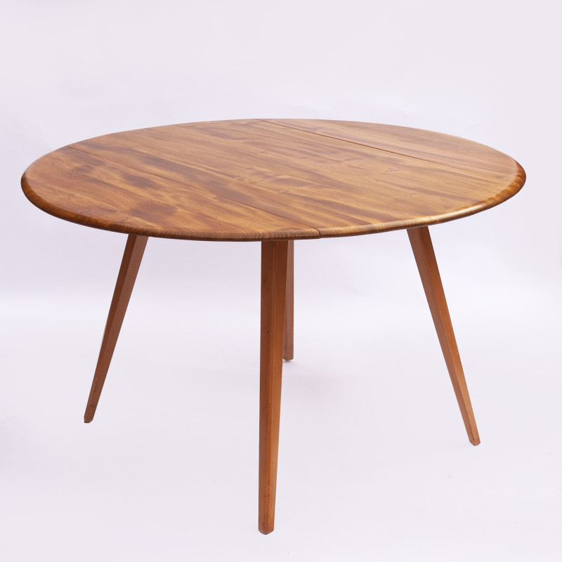 Mesa redonda vintage en madera de haya y olmo de Ercol, Reino Unido 1960