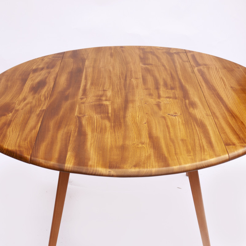 Vintage beechwood and elmwood round dining table by Ercol, UK 1960s