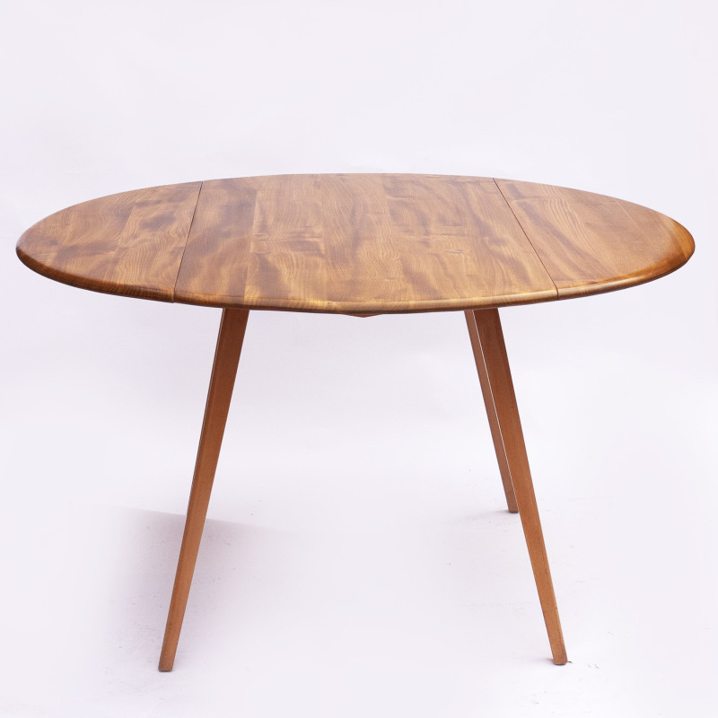 Vintage beechwood and elmwood round dining table by Ercol, UK 1960s