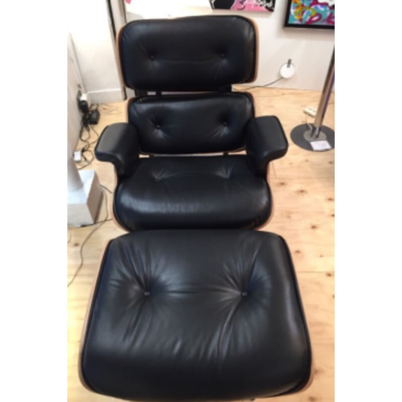Herman Miller lounge chair in black leather and rosewood, Charles EAMES - 2000s