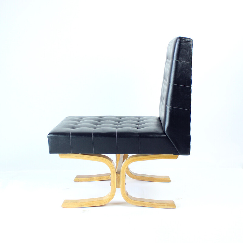 Fauteuil noir vintage Bratislava de Jindrich Volak pour Drevopodnik Holesov, 1960