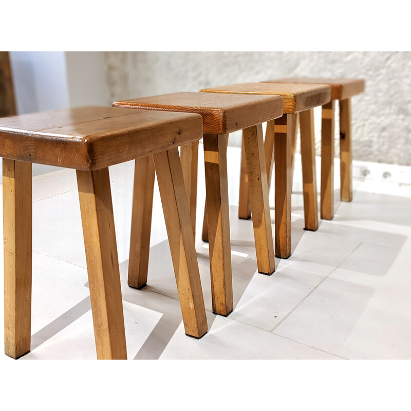Set of 4 vintage stools in pine wood by Charlotte Perriand for Les Arcs, 1800