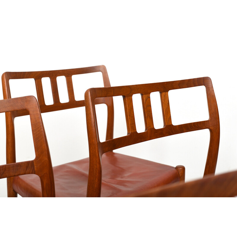 Set van 6 vintage stoelen van Niels O. Møller, teak en rood leer, 1960.