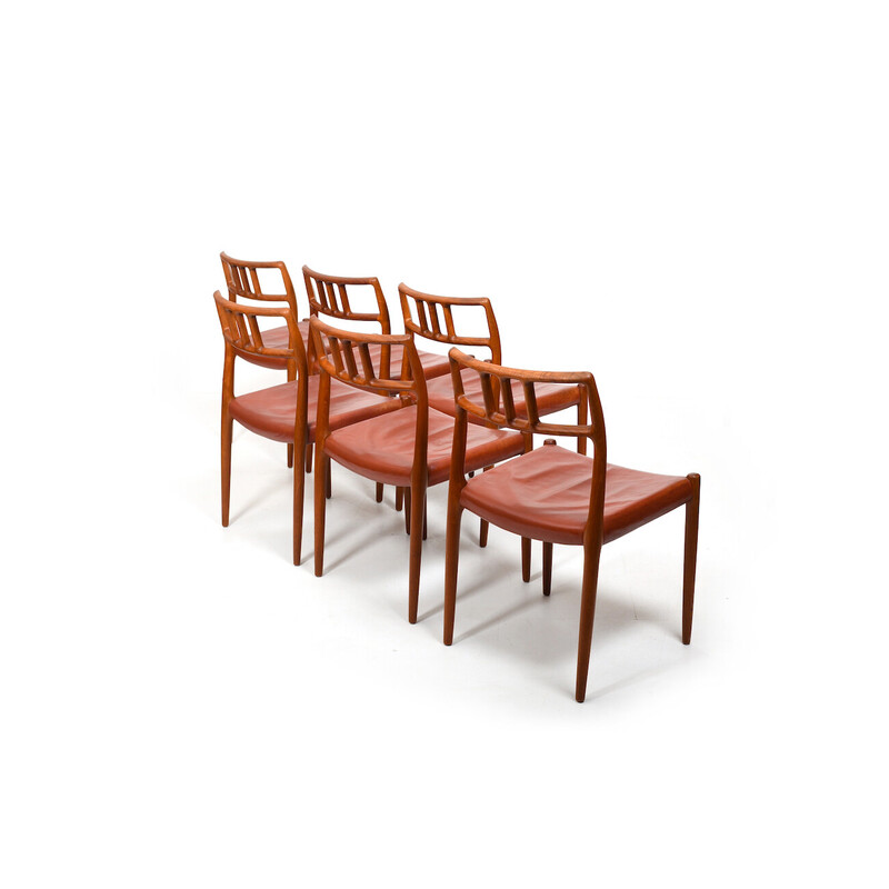 Set van 6 vintage stoelen van Niels O. Møller, teak en rood leer, 1960.