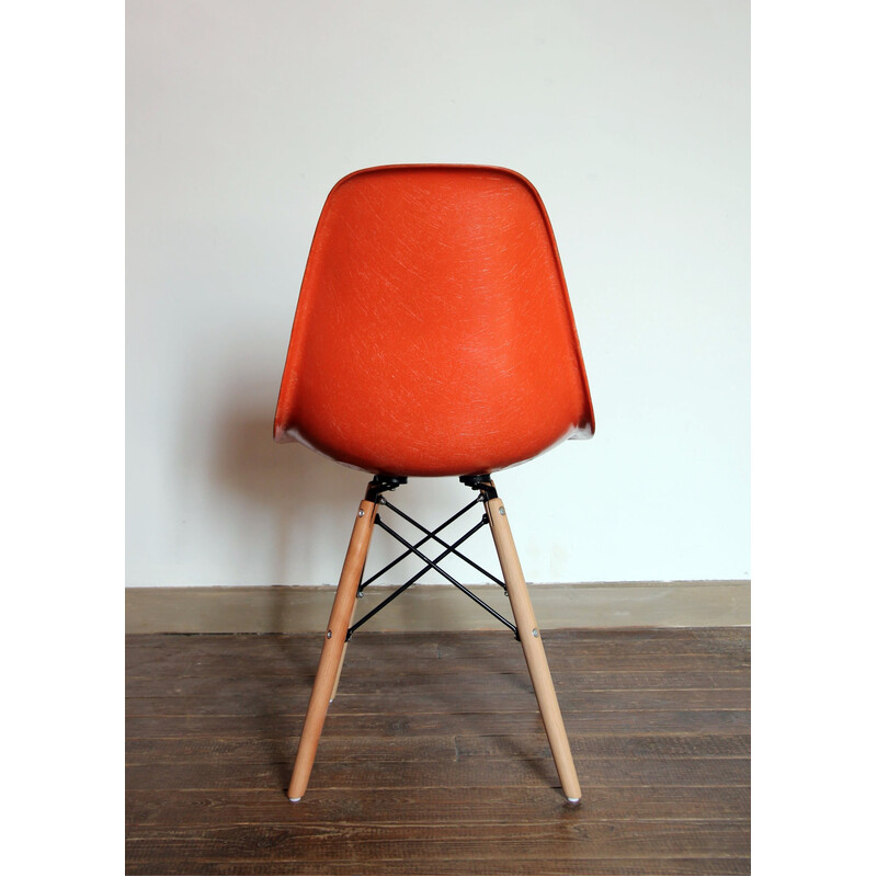 Pair of vintage orange Dsw chairs by Charles and Ray Eames for Herman Miller