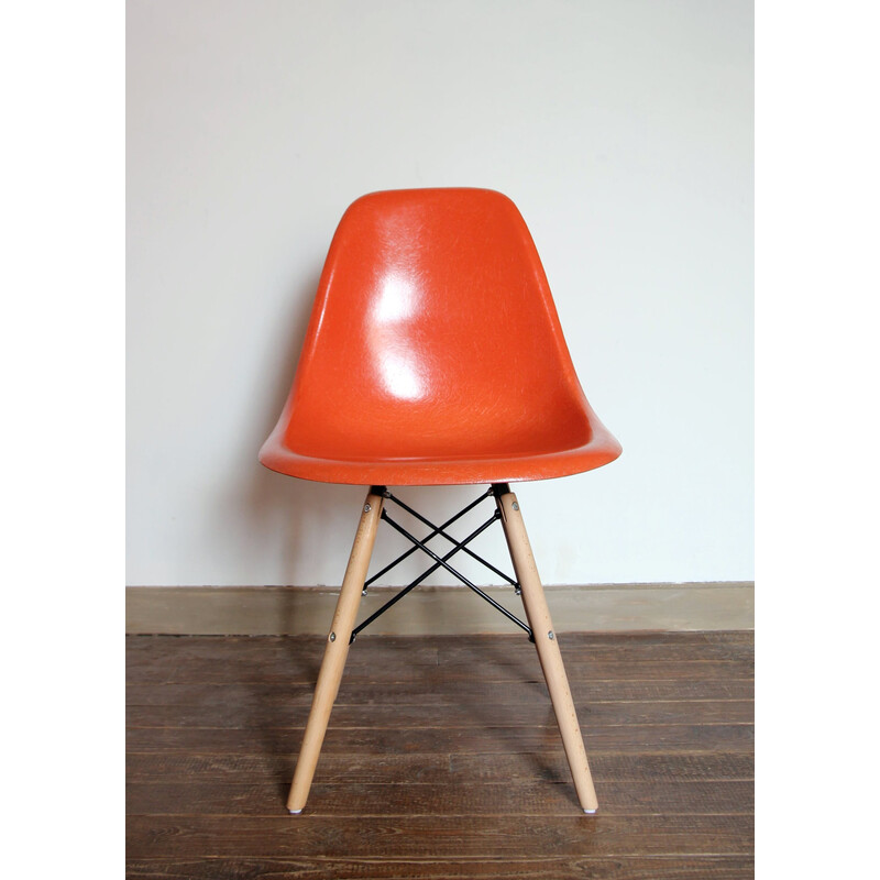 Pair of vintage orange Dsw chairs by Charles and Ray Eames for Herman Miller