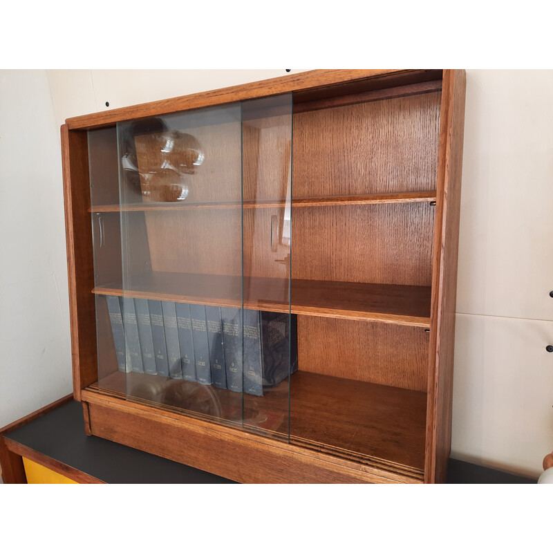 Vintage oakwood bookcase with two sliding doors by Marcel Gasgoin