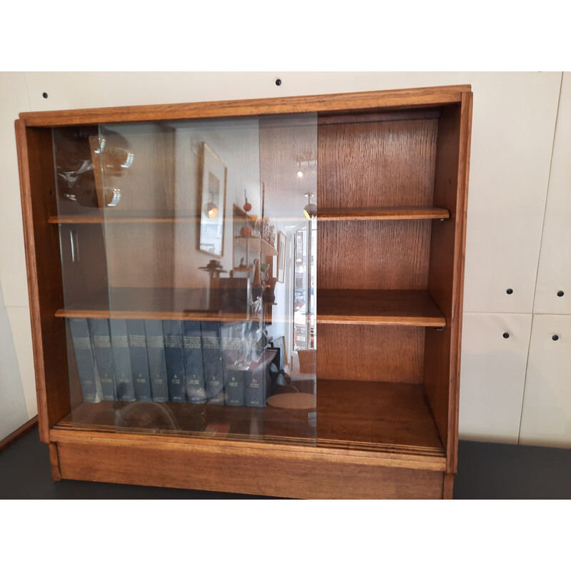 Vintage oakwood bookcase with two sliding doors by Marcel Gasgoin