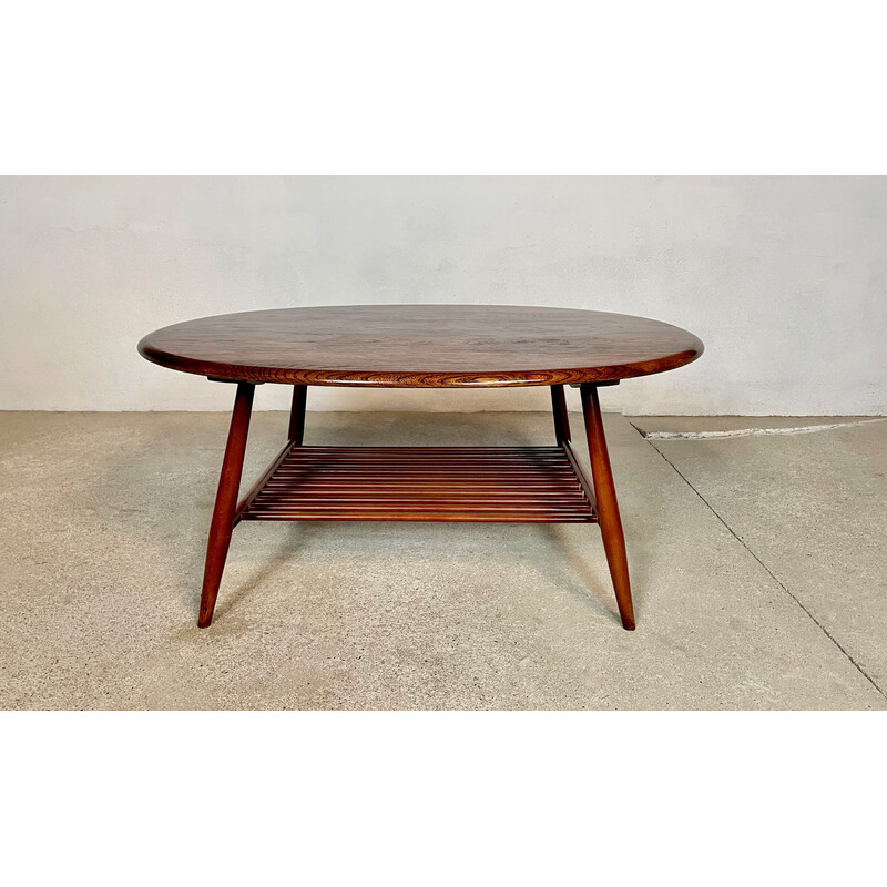 Mesa de centro ovalada vintage con estante de Lucian Randolph Ercolani para Ercol, años 50