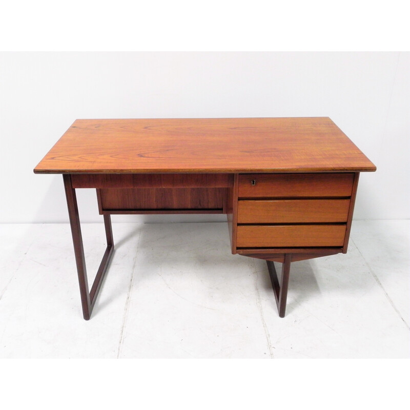 Scandinavian desk in teak on sled base - 1970s