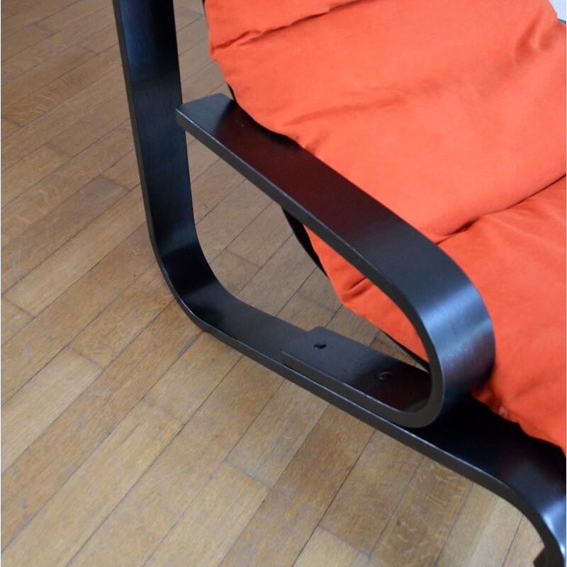 Scandinavian design armchair in orange and black - 1980s