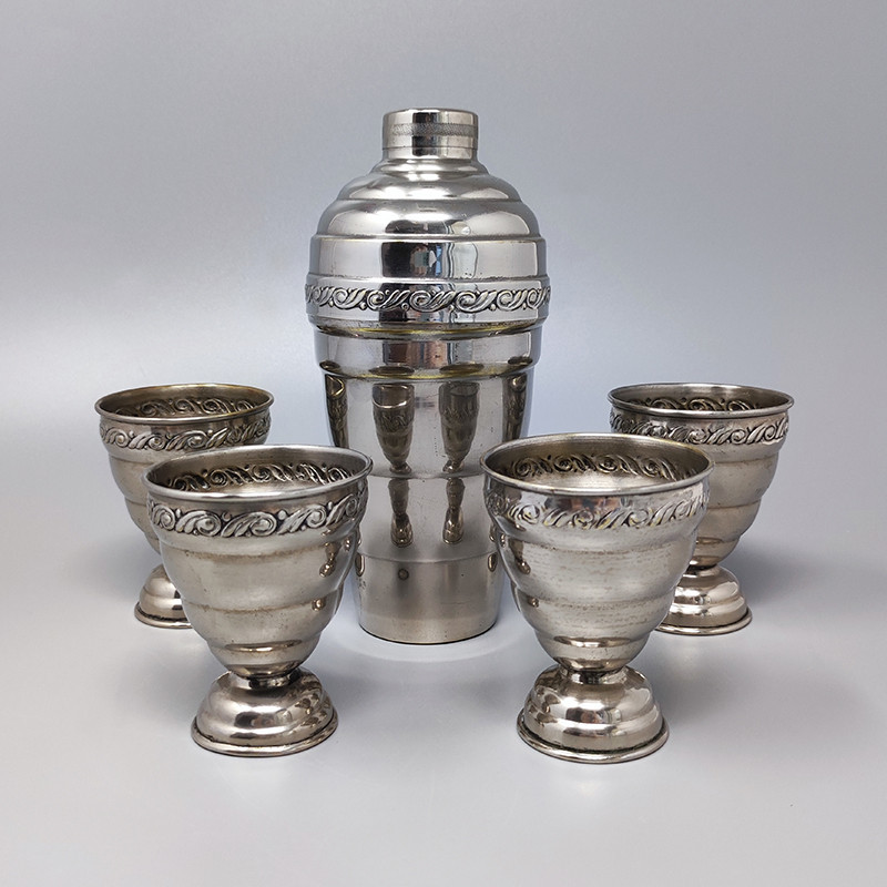 Vintage cocktail shaker set with four glasses in stainless steel, Italy 1950s