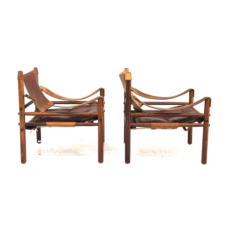 Pareja de sillones vintage "Sirocco" en madera de palisandro y cuero de Arne Norell, Suecia 1960