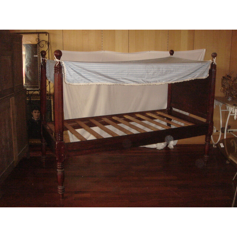 Vintage mahogany canopy bed with slats