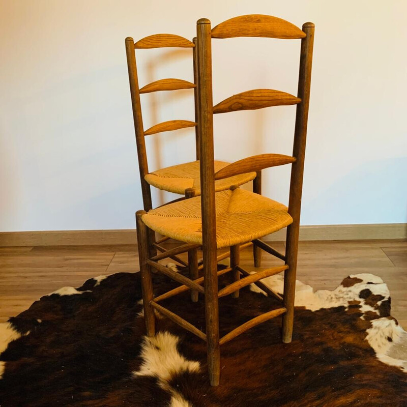 Pair of vintage solid wood straw chairs