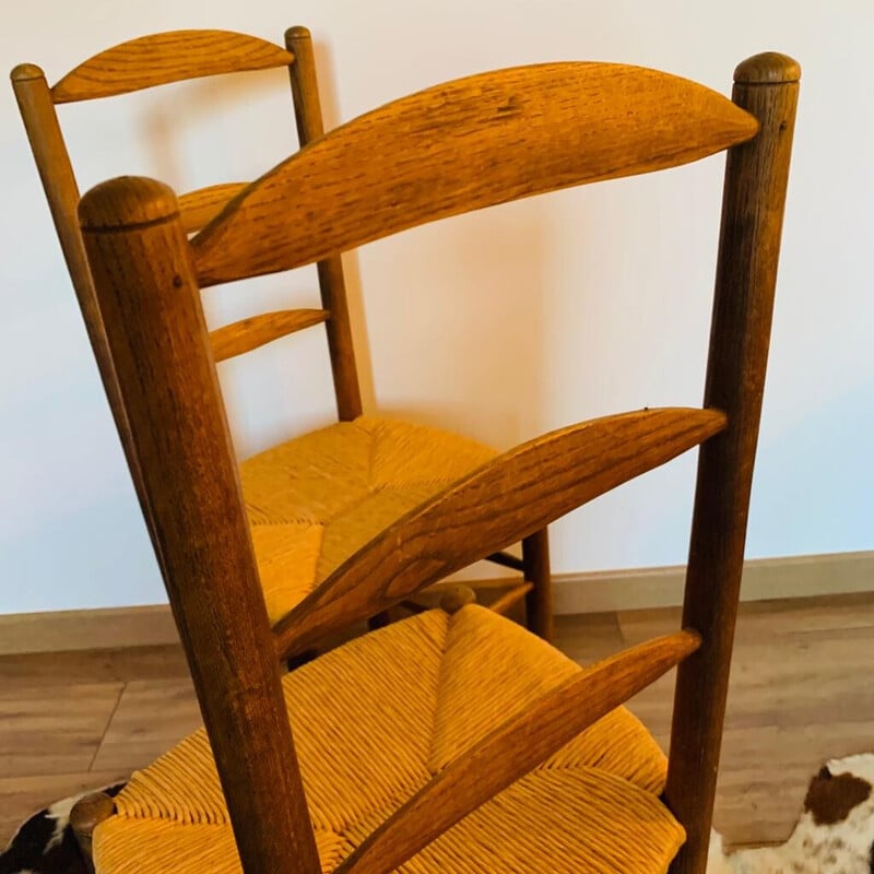 Pair of vintage solid wood straw chairs
