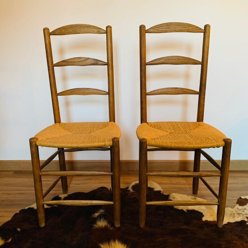 Pair of vintage solid wood straw chairs