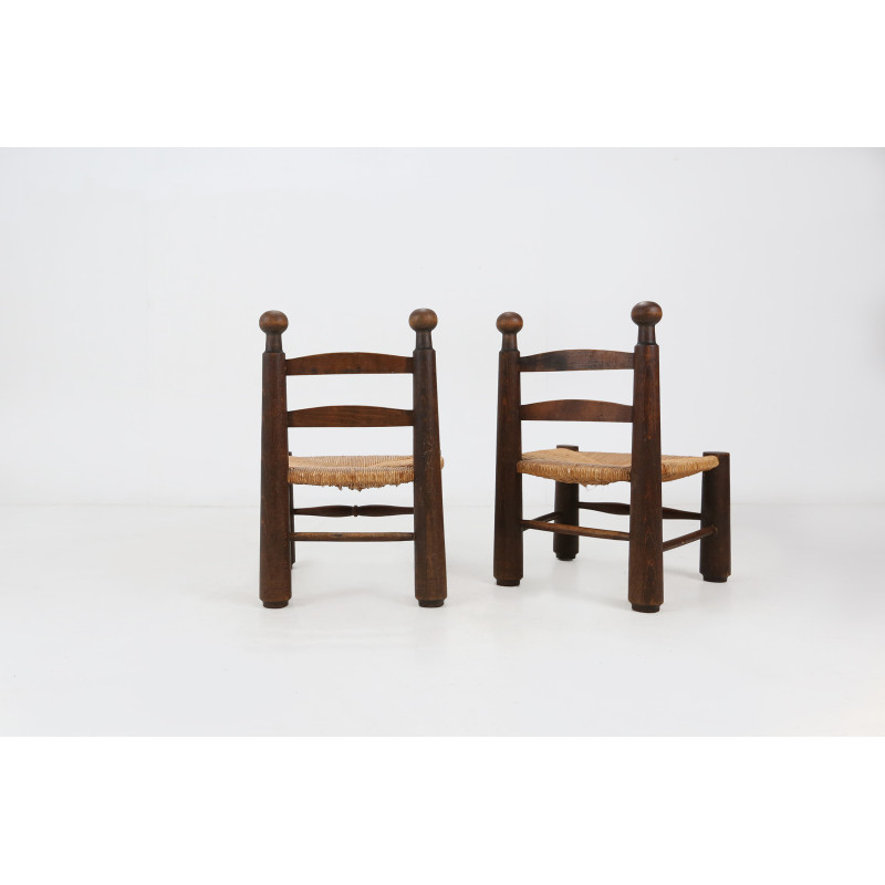 Pareja de sillas vintage de madera y mimbre de Charles Dudouyt, 1940