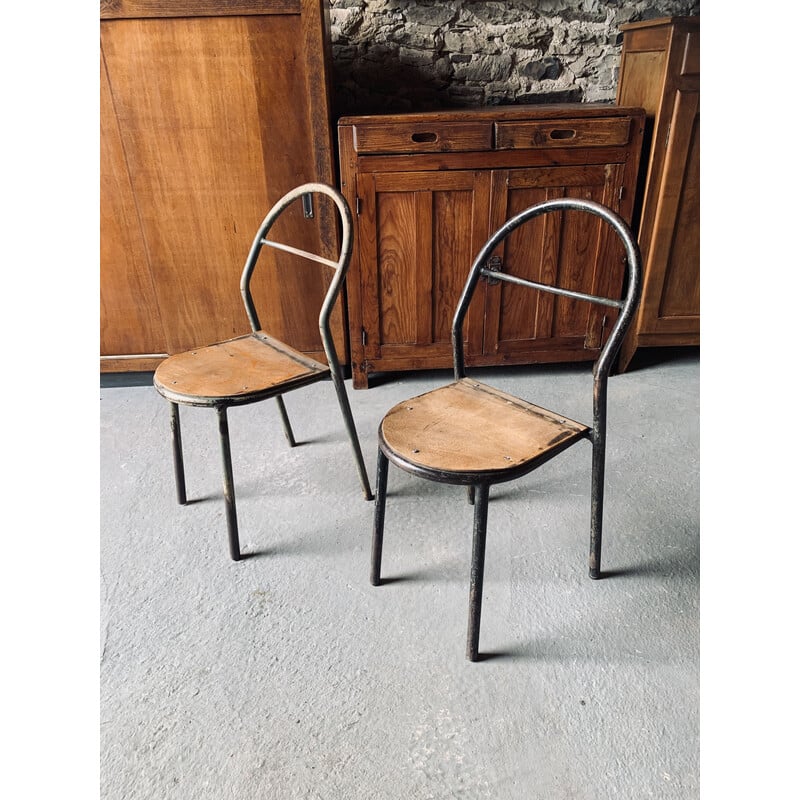 Pair of vintage stacking chairs by René Herbst for Mobilor, 1950