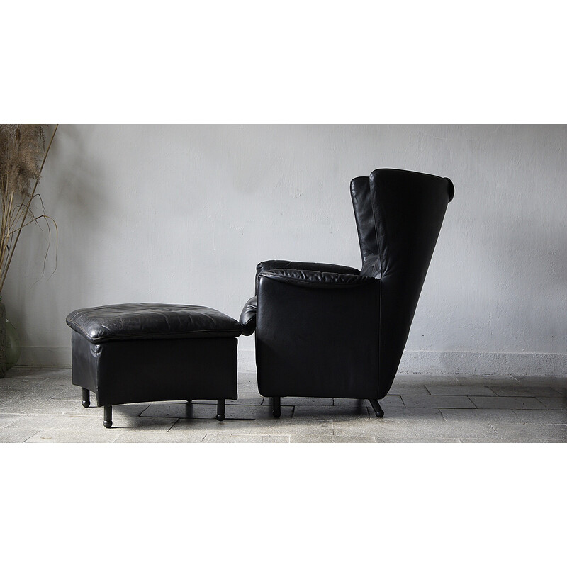 Vintage black leather lounge armchair with footrest by De Sede, Canada 1980