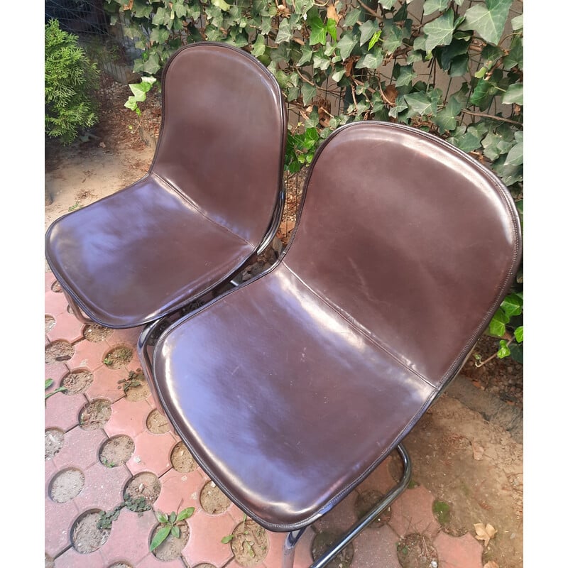 Pair of vintage dining chairs covered with cow leather by Gastone Rinaldi, Italy 1960s