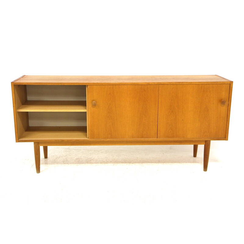 Vintage oakwood sideboard with sliding doors, Sweden 1960