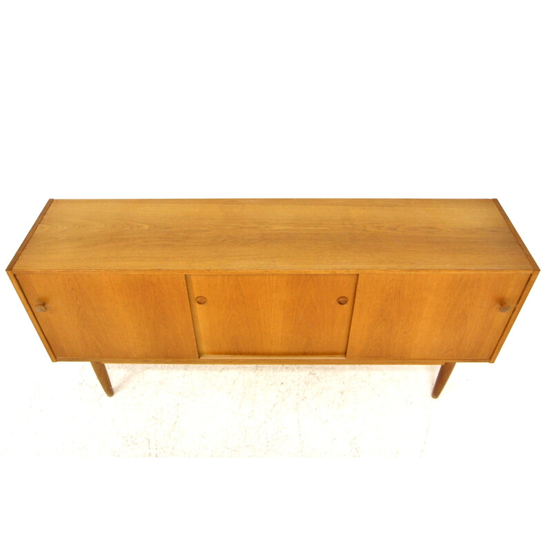 Vintage oakwood sideboard with sliding doors, Sweden 1960