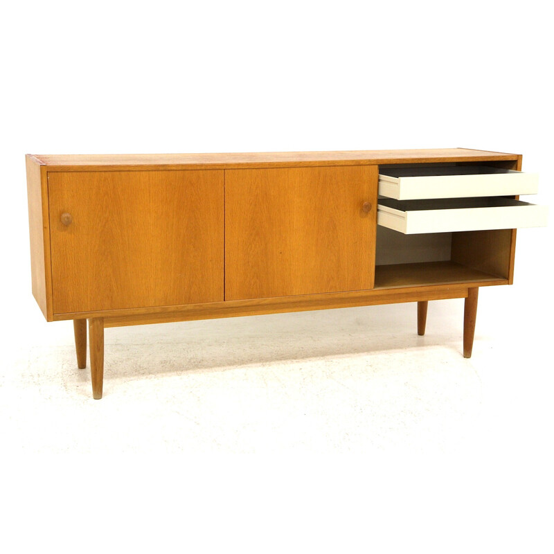 Vintage oakwood sideboard with sliding doors, Sweden 1960