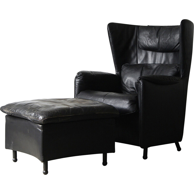 Vintage black leather lounge armchair with footrest by De Sede, Canada 1980