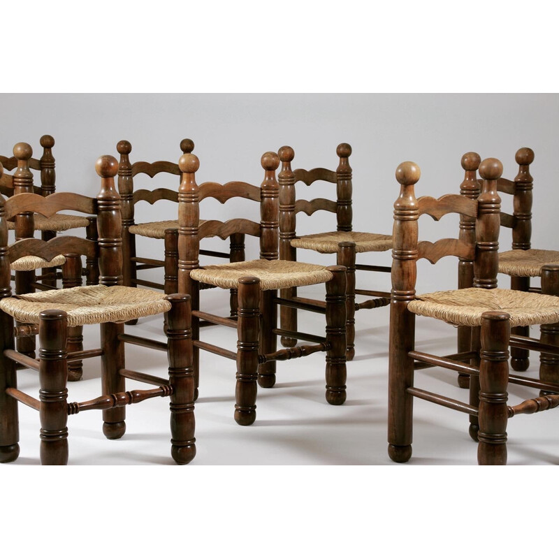 Set of 8 vintage wooden chairs and straw seats by Charles Dudouyt, France 1950