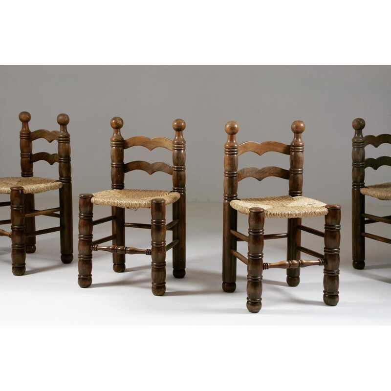 Set van 8 vintage houten stoelen en rieten zittingen van Charles Dudouyt, Frankrijk 1950