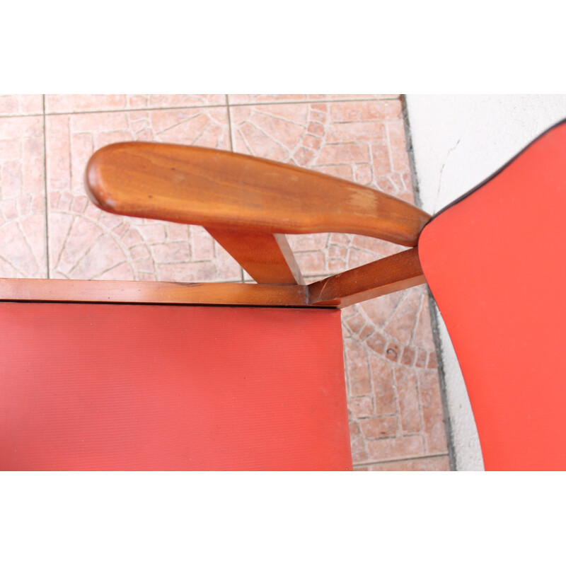 Pair of vintage red grooved vinyl bridge chairs, 1950