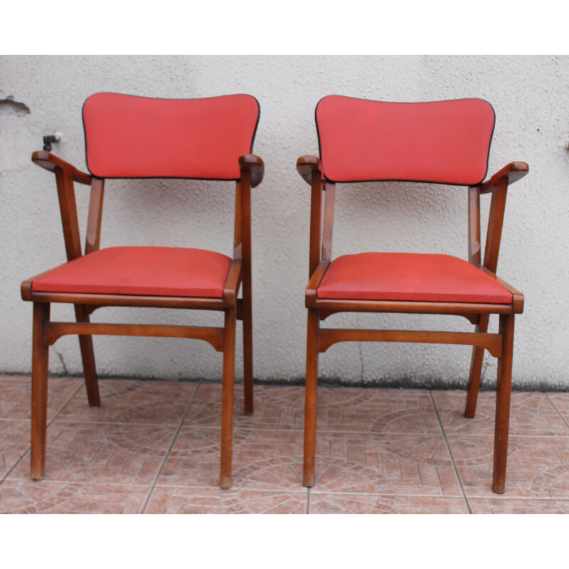 Paar vintage rood gegroefde vinyl brugstoelen, 1950