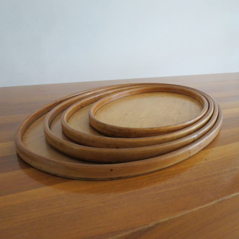 Conjunto de 4 tabuleiros ovais de madeira de bétula e contraplacado, anos 30