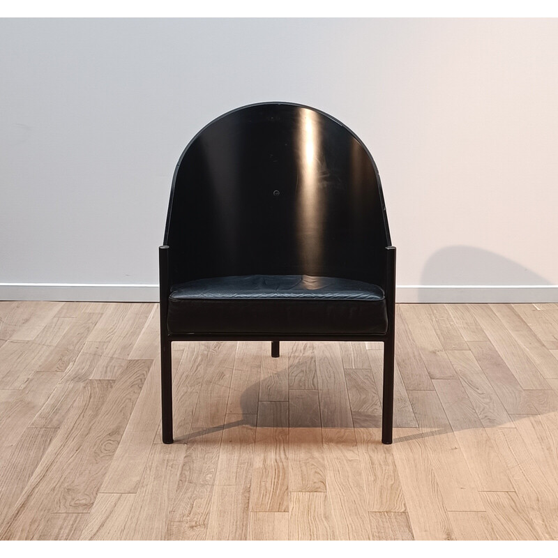 Poltrona vintage Pratfall in legno scuro e pelle nera di Philippe Starck