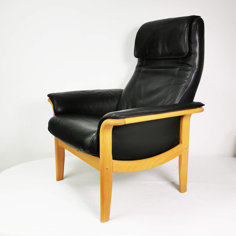 Vintage leather armchair with footrest, Denmark 1980s