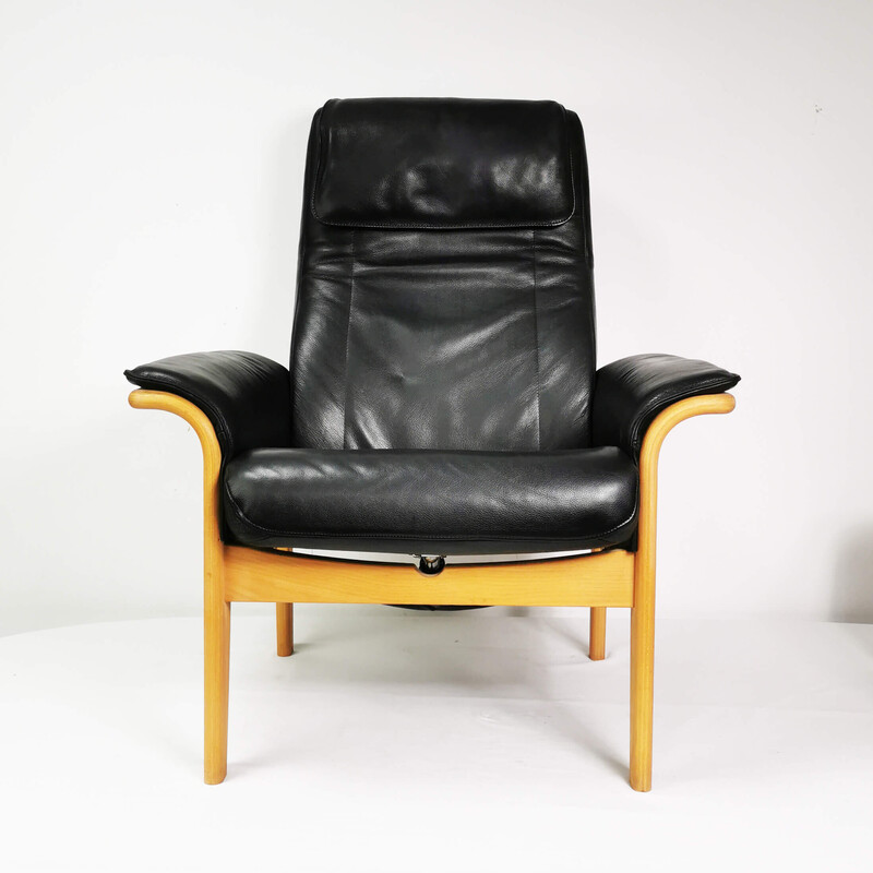 Vintage leather armchair with footrest, Denmark 1980s