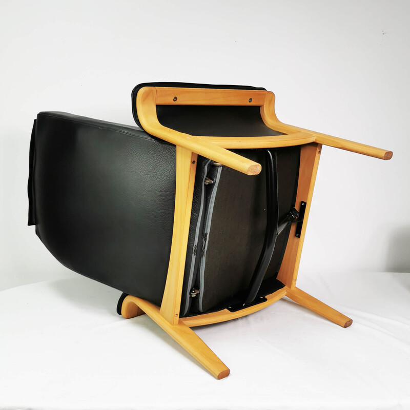 Vintage leather armchair with footrest, Denmark 1980s