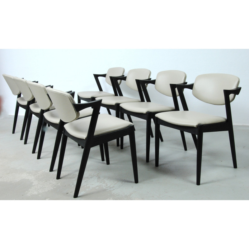 Set of 8 vintage oakwood chairs with upholstery by Kai Kristiansen