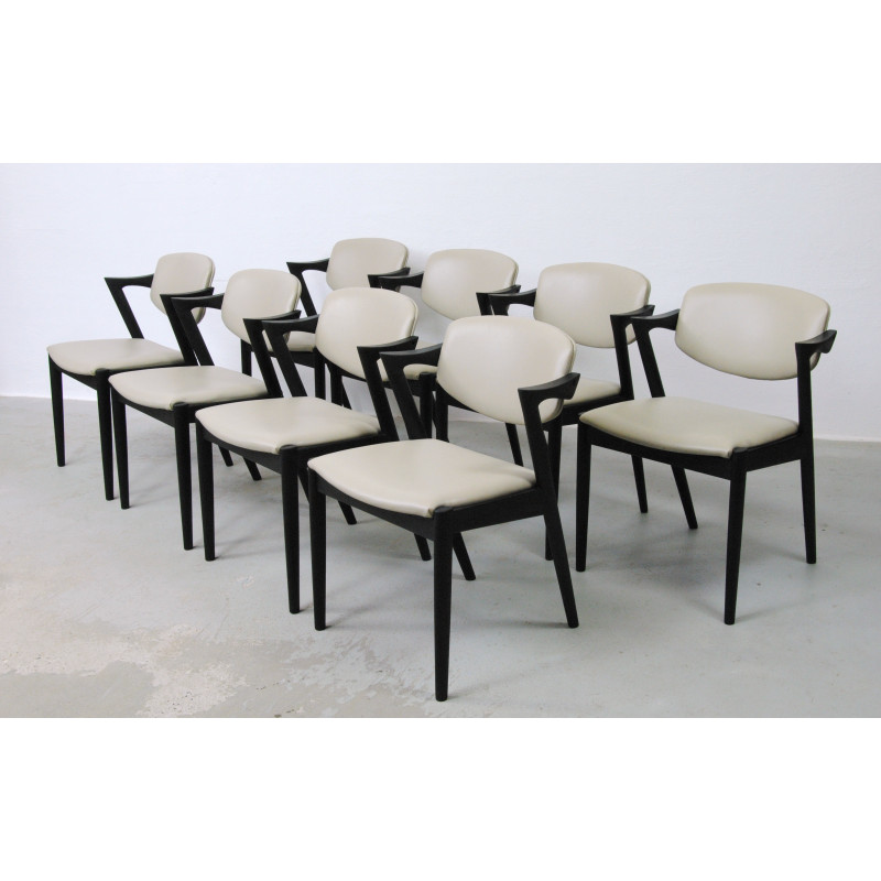 Set of 8 vintage oakwood chairs with upholstery by Kai Kristiansen