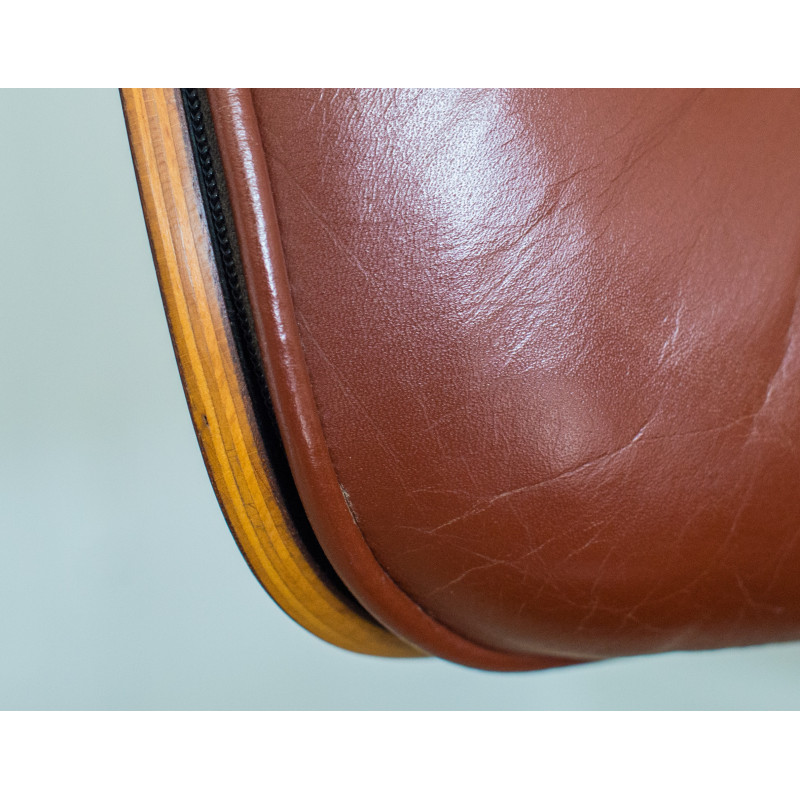 Sillón Eames vintage de cuero y palisandro de Herman Miller, EE.UU. Años 70