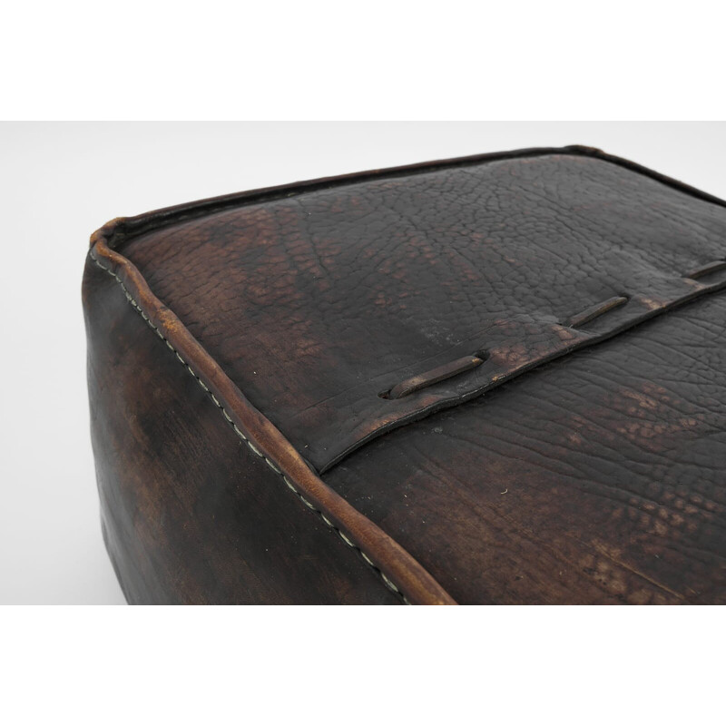 Pair of vintage leather poufs with carrying handle