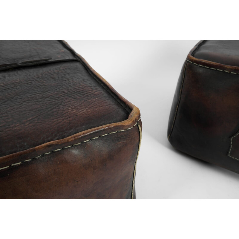 Pair of vintage leather poufs with carrying handle