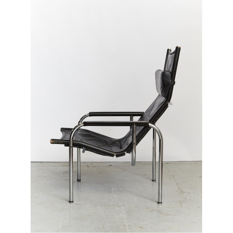 He1106 vintage armchair in chrome steel and leather by Hans Eichenberger for Strässle