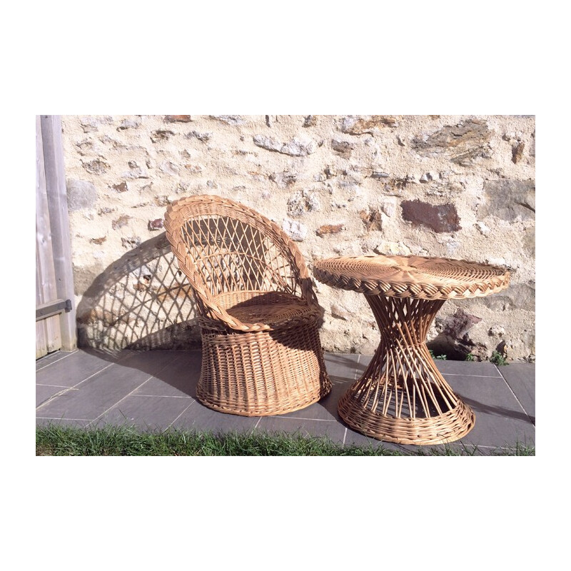 Set of an armchair "diabolo" in rattan with its little coffee table in rattan - 1960s