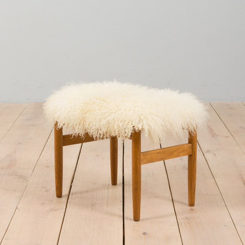 Danish mid century solid oakwood footrest with long sheepskin wool, 1970s
