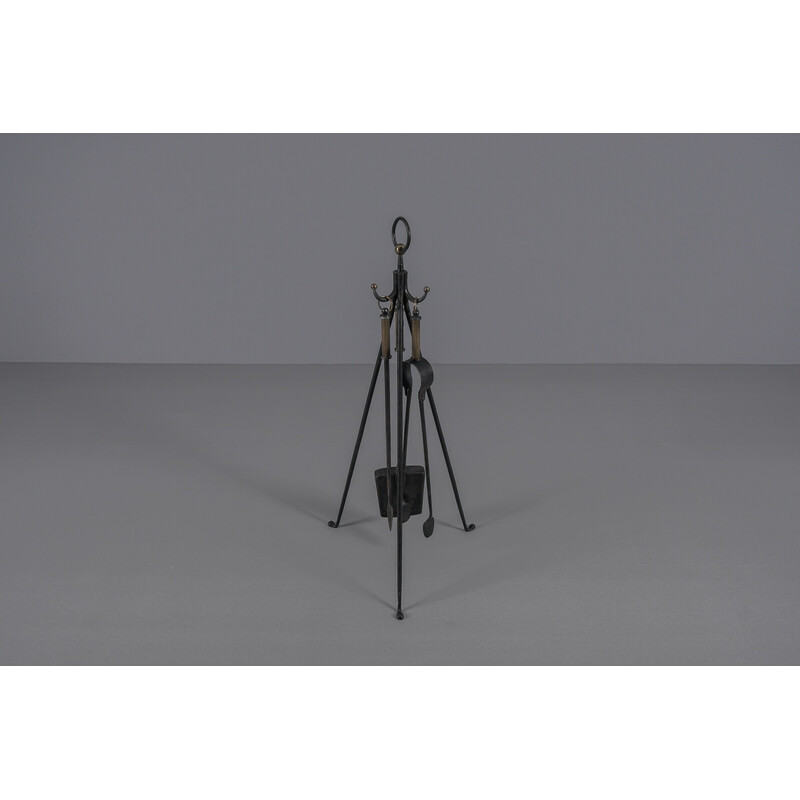 Vintage fand forged tripod iron and brass stand with fireplace tools, Austria 1950s