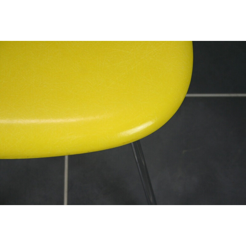 "Dsx" yellow chair in fiber glass and chromed steel by Eames for Herman miller - 1960s