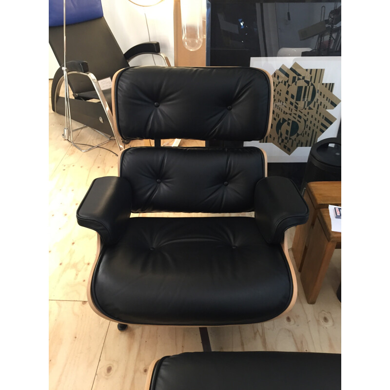 Fauteuil lounge chair Herman Miller en cuir noir et palissandre, Charles EAMES - 2000