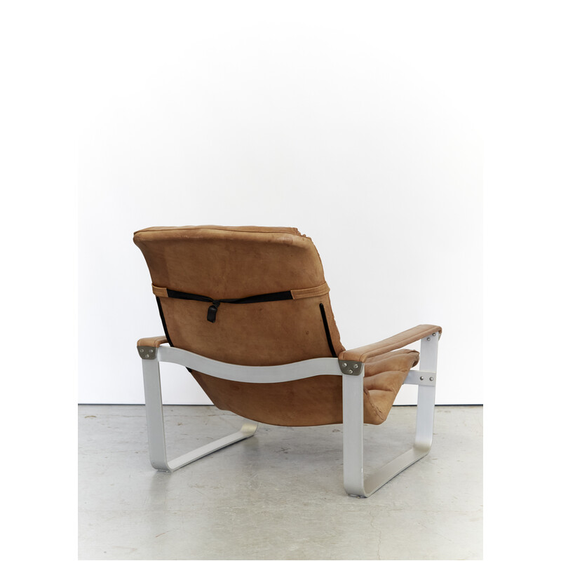 Pulkka fauteuil en poef uit het midden van de eeuw, Ilmari Lappalainen voor Asko, 1960.